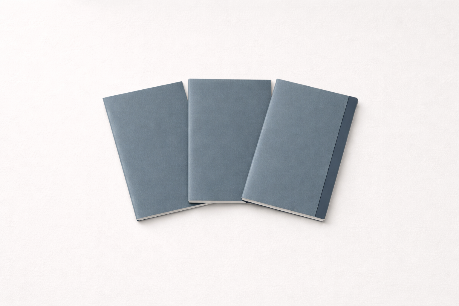 Slate blue notebook trio arrangement